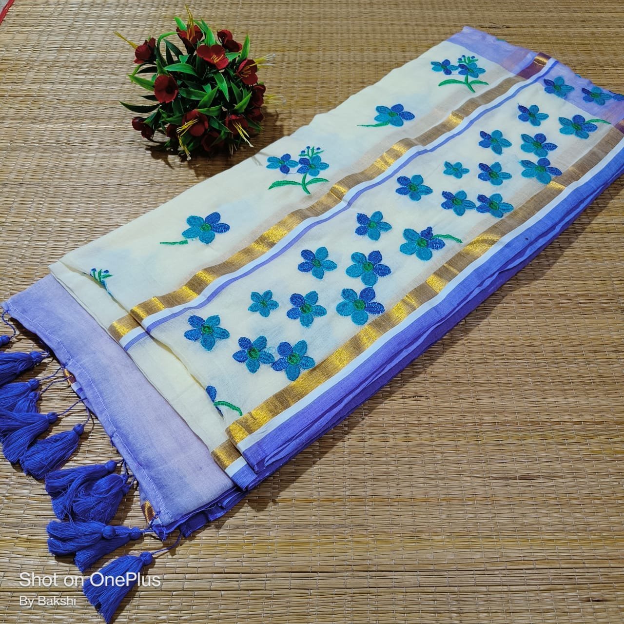 White And Blue Exclusive Pure Mul Cotton Saree with Intricate Embroidery Work